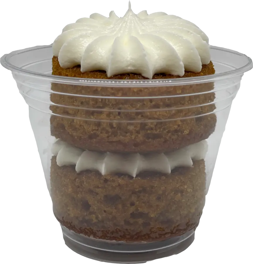 Carrot cake dessert with white frosting at Test Kitchen BBQ